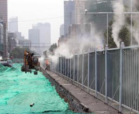 Construction site enclosure misting system