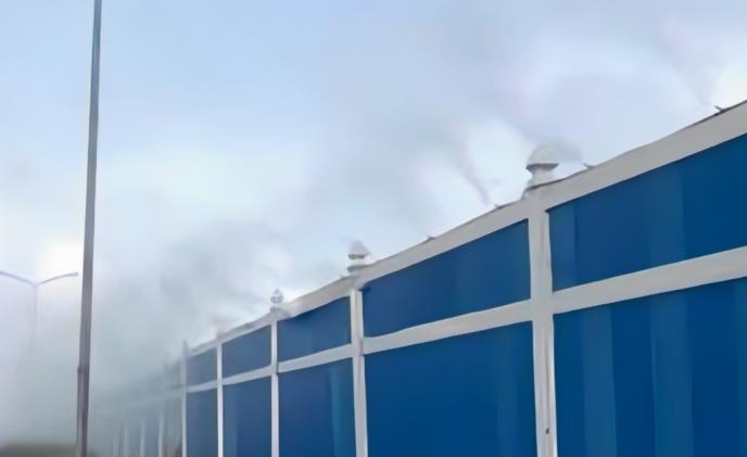 Construction site enclosure misting system